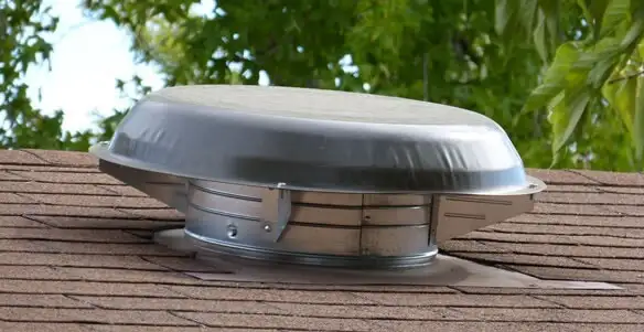 attic fan installation services with low-profile roof ventilation unit in Long Beach, CA
