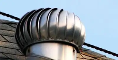 attic fan installation services with professionally installed roof ventilation unit in Long Beach, CA