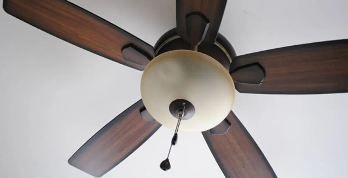 Fully installed ceiling fan with balanced blades and light fixture in Long Beach, CA