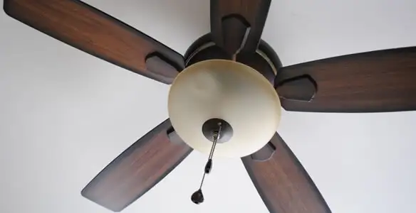 Fully installed ceiling fan with balanced blades and light fixture in Long Beach, CA