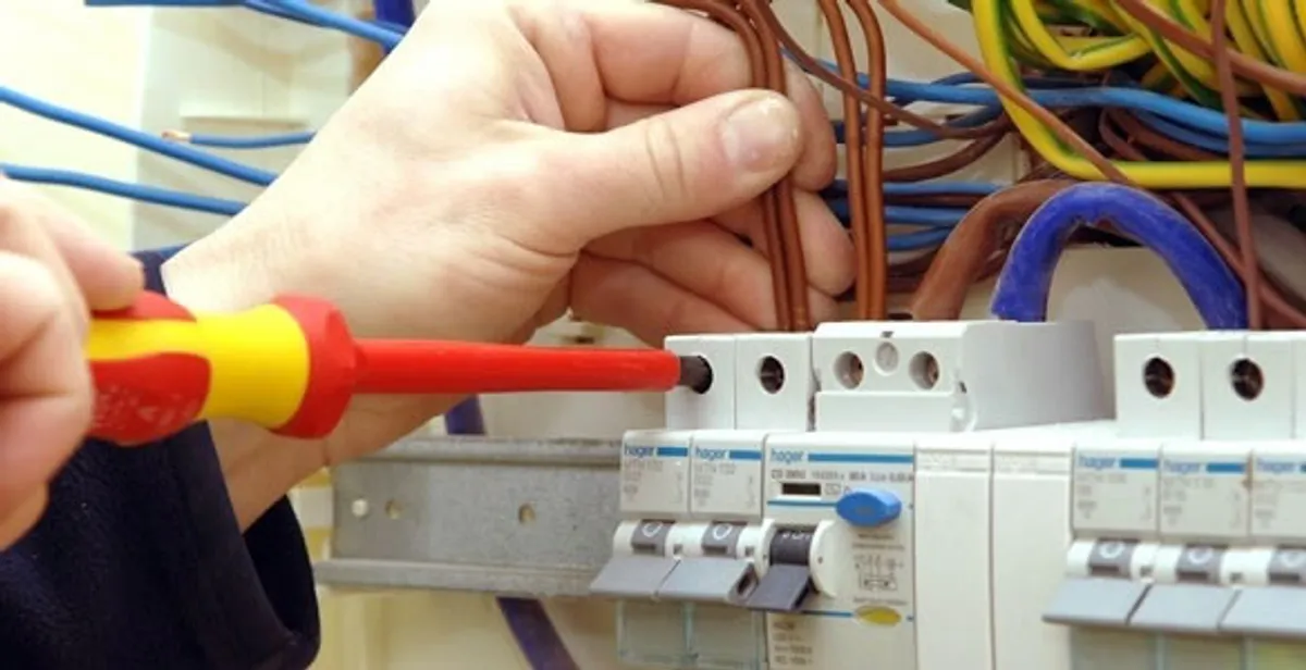 electrician services performing professional electrical panel wiring and connections in Long Beach, CA