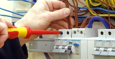 electrician services performing professional electrical panel wiring and connections in Long Beach, CA
