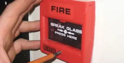 fire alarm installation service showing manual fire alarm pull station installed by licensed electricians in Long Beach, CA