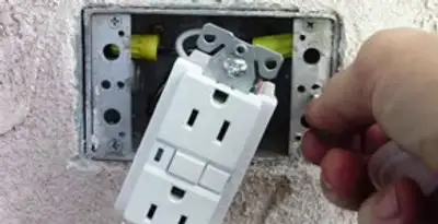gfci circuits service showing installation of a ground fault circuit interrupter outlet by licensed electricians in Long Beach, CA