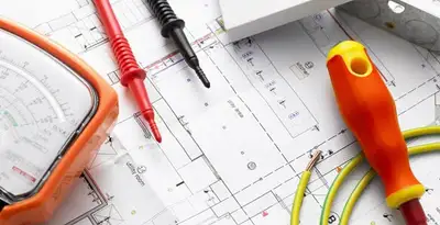 licensed electrician planning and testing electrical systems using professional tools in Long Beach, CA