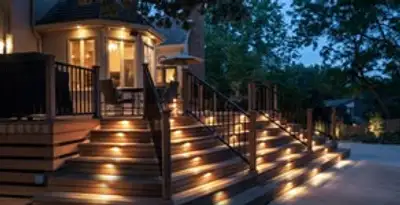 Residential electrician installing outdoor lighting for home safety in Long Beach, CA