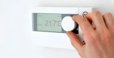 Thermostat installation service with professional adjusting temperature control in Long Beach, CA