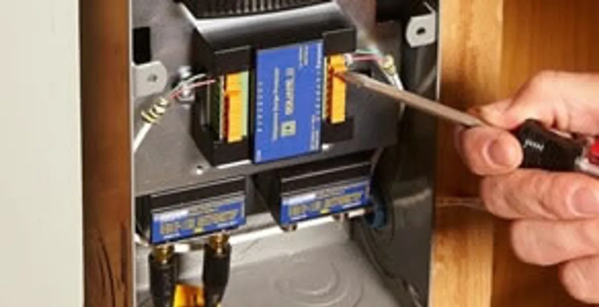 Whole home surge protection device being installed by a licensed electrician to protect electrical systems in Long Beach, CA