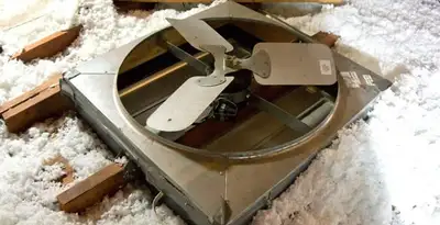 whole house fan installation services with attic-mounted ventilation unit in Long Beach, CA
